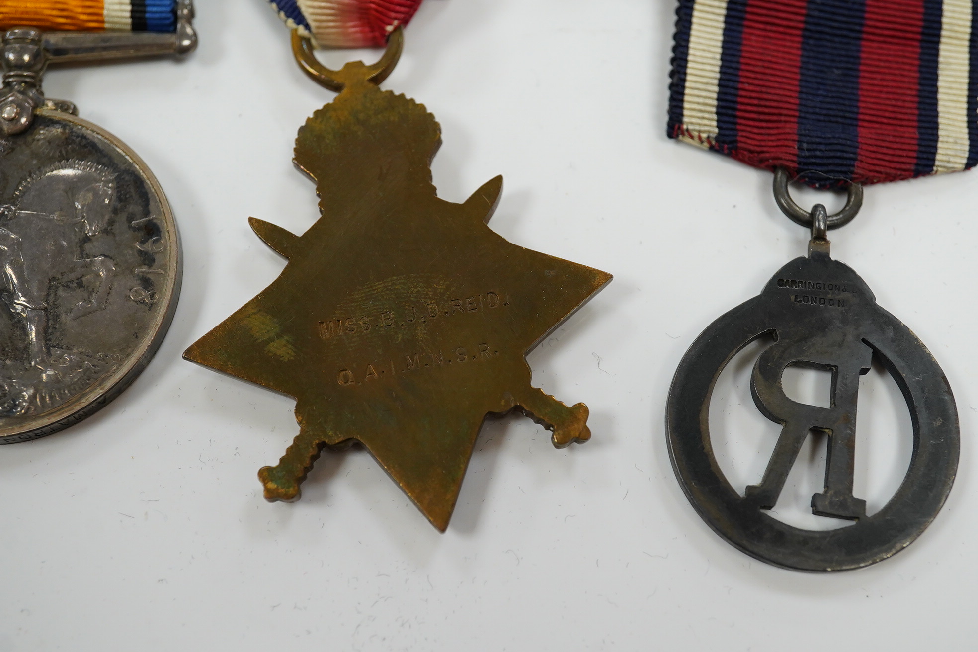 A Great War trio with oakleaf to Assistant Matron B.J.D.Reid, Queen Alexandra's Imperial Military Nursing Service with Royal Red Cross medal and Military Nursing Service Reserve Badge (5)